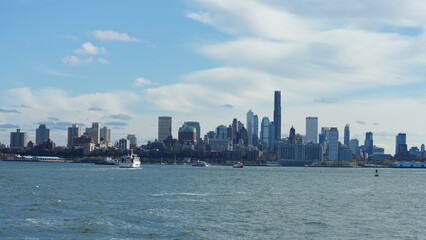 Fototapeta premium The New York manhattan view from the ferry boat in the sunny day