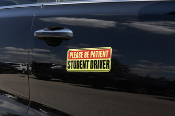 Please Be Patient Student Driver bumper sticker. Student Drivers are required to meet hour requirements to get a license.