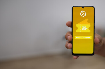 Promo code Discount coupon number field on mobile phone screen. Business and marketing concept.
