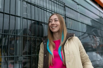 Woman Standing in Front of Metal Fence