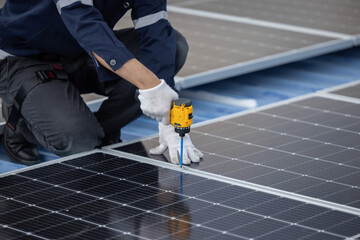 Engineer repair solar panel on the factory rooftop