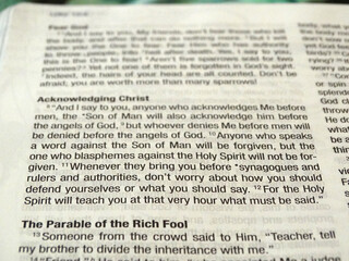 Close up of text in the Gospels of the Bible, recounting the birth and existence of Jesus