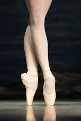 Ballet legs in pointes close-up photo
