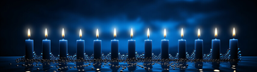 Blue candles illuminate a dark scene.