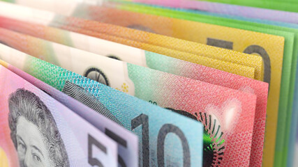 Close-up view of Australian dollar banknotes in different denominations.