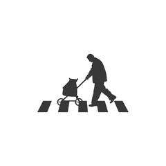 Silhouette of Elderly Person Crossing Street with Shopping Cart