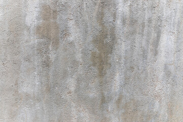 background of heterogeneous gray concrete wall