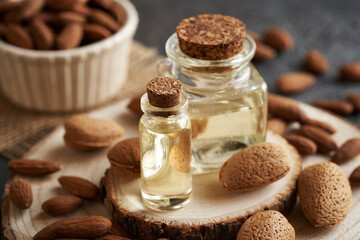 Cosmetic almond oil in two glass bottles