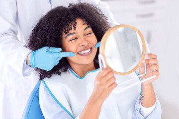 Woman, patient and dentist with mirror for teeth whitening in clinic for dental surgery and results with doctor. People, satisfied and happy on consultation for root canal procedure and oral care