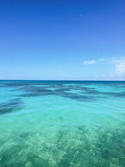 beach with blue sky and clouds