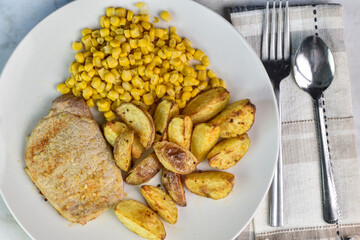 seasoned boneless pork chop  with  corn