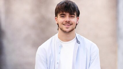 portrait of young boy or man outdoors