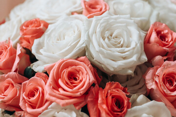 Gift wedding bouquet of white, yellow and red roses