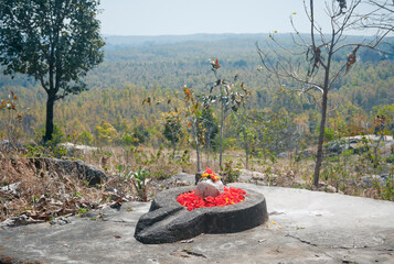 Place of worship amidst rustic wilderness of deciduous nature. Local tribals have worshipped the...