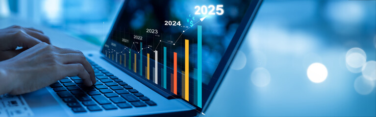 2025 Businesswoman analyzing company financial balance sheet working with digital virtual graphics Businesswoman calculating financial data for long term investment growth goals