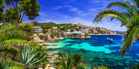 Fotobehang Donkerblauw Best scenic beaches of Mallorca Balearic island - beautiful Cala Fornells near Peguera, popular tourist resort and amazing turquoise crystal sea . Spain summer holidyas  © Freesurf