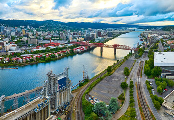 Fototapeta premium Aerial Fly Through of Portland River Bridges at Golden Hour