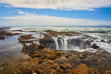 Rugged Rocks and Cascading Waves at Thor's Well Oregon Eye-Level Perspective