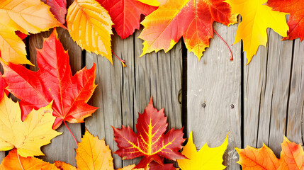 A rustic wooden table covered with a variety of red, orange, and yellow autumn leaves. The leaves are arranged in a natural, scattered pattern. Negative space on sides for text.