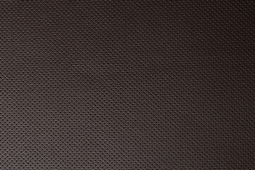Clean perforated brown leather background