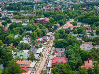 Fototapeta premium Palanga city aerial view. Central Basanavicius street and surroundings of the most famous Baltic countries resort by Baltic sea. Drone photo