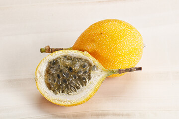 Yellow granadilla with cut half