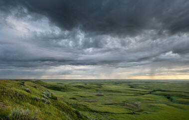 Storm clouds over the Valley of 1000 Devils in Grasslands National Park, Saskatchewan, Canada