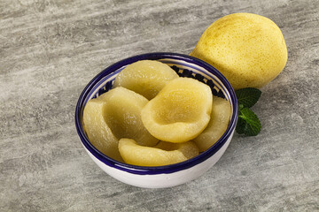 Canned yellow pear with syrup
