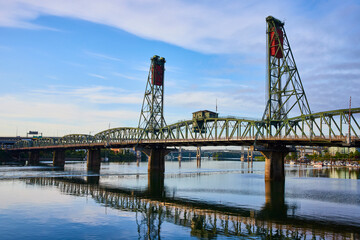 Steel Truss Lift Bridge and Reflections at Riverfront - High Eye-Level View