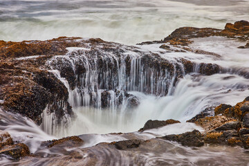 Dynamic Ocean Waterfall at Thor's Well Close-Up Perspective
