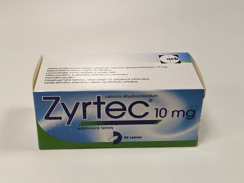 Prague, Czech Republic - July 10 2024: Zyrtec box of medication with cetirizine active substance by UCB, used for treatment of allergic rhinitis and chronic urticaria.