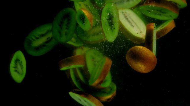 kiwi in the water on a black background