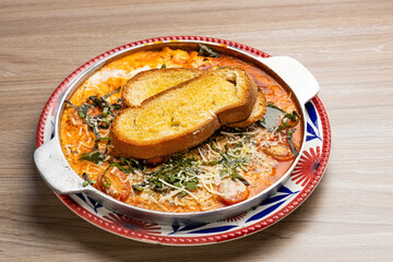 Breakfast with eggs, grated tomatoes, fresh basil and parmesan - Neapolitan eggs with toast
