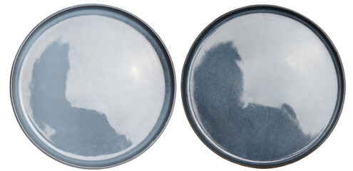 Empty blue ceramic plate on isolated background, top view