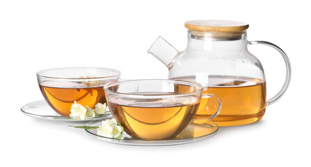 Aromatic jasmine tea in cups, flowers and teapot isolated on white