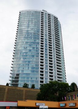 Minneapolis, Minnesota, U.S.A - July 9, 2024 - The luxury high rise glass building of LPM Apartments
