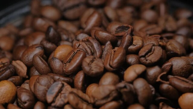 coffee beans on a dark background macro video