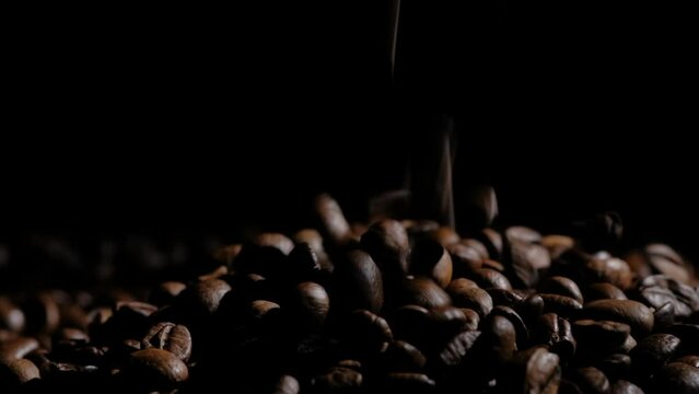 coffee beans on a dark background macro video