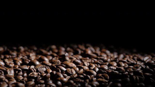 coffee beans on a dark background macro video