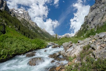 Stunning mountain landscape with a flowing river in Yellowstone Park