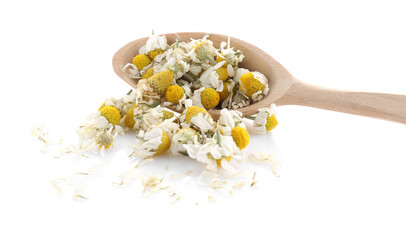 Chamomile flowers in wooden spoon isolated on white