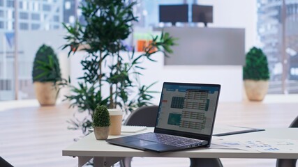 Stock exchange portfolio on laptop containing investment assets affected by market volatility. Empty workplace with live index indices on notebook screen showing stock demand surge