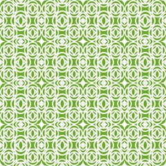 Seamless geometric pattern of circles and stars on white. on a green background