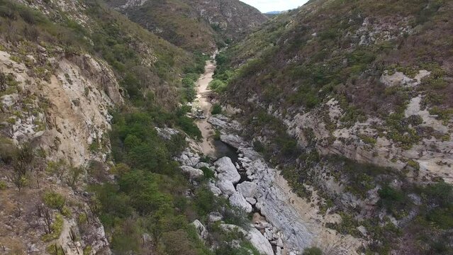 Aerial view of C&acirc;nion dos Apertados, dry temporary river bed during dry season - Currais Novos, Rio Grande do Norte, Brazil