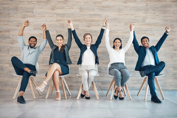 People, recruitment or success on chair with hands or celebration, portrait with onboarding in...