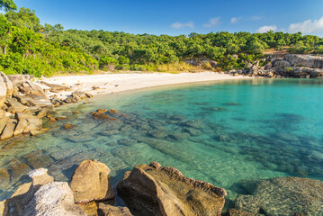 Picturesque tropical Pebbly Beach with turquoise water on Lizard Island, Australia. Lizard Island  is located on Great Barrier Reef in north-east part of Queensland