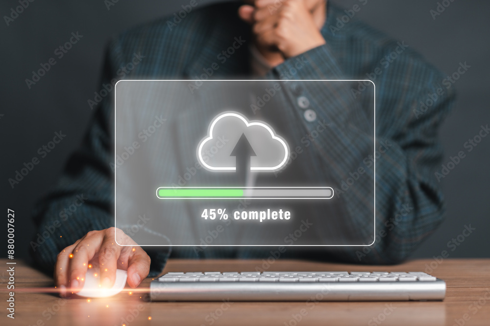 Poster a businessman in a suit uploads data to the cloud, with a progress bar showing 45% completion on a t