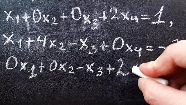 Algebra equation on chalk board. Math concept, teaching algebra written equation.