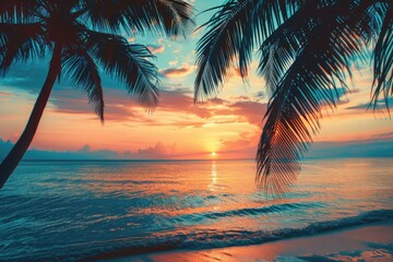 Tropical beach at sunset. Palm trees and sea waves. Paradise island. Trip, travel and vacation theme