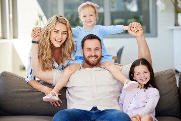 Happy portrait, parents and kids on sofa for healthy relationship, bonding time and security in family home. Smile, mom and dad with girl children for love support, safety and relax together on couch